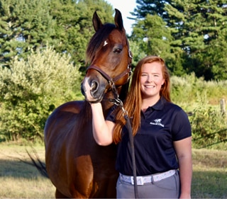 SmartPak customer care representative with her bay Morgan Horse.